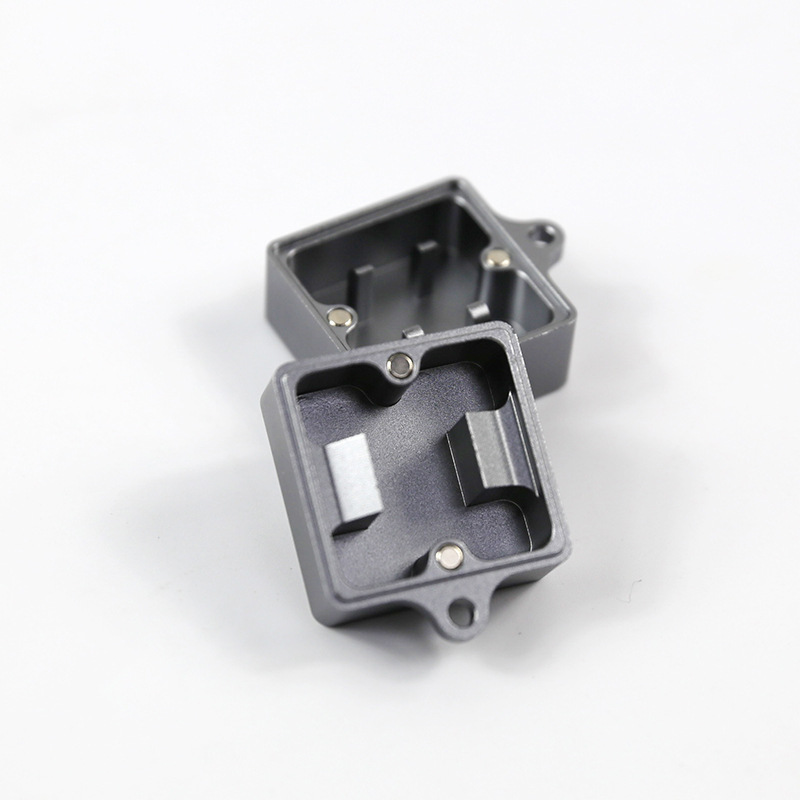 Gray metal keyboard switch opener shown open