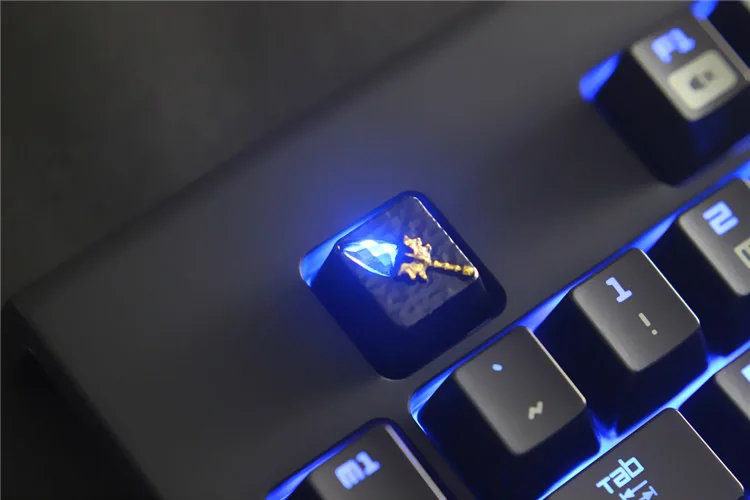 DOTA staff metal keycap showing illuminated translucent acrylic