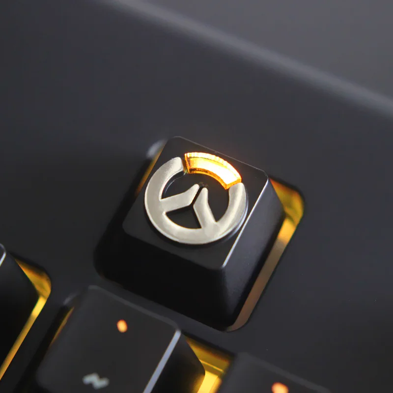 Overwatch logo metal keycap with orange translucent acrylic