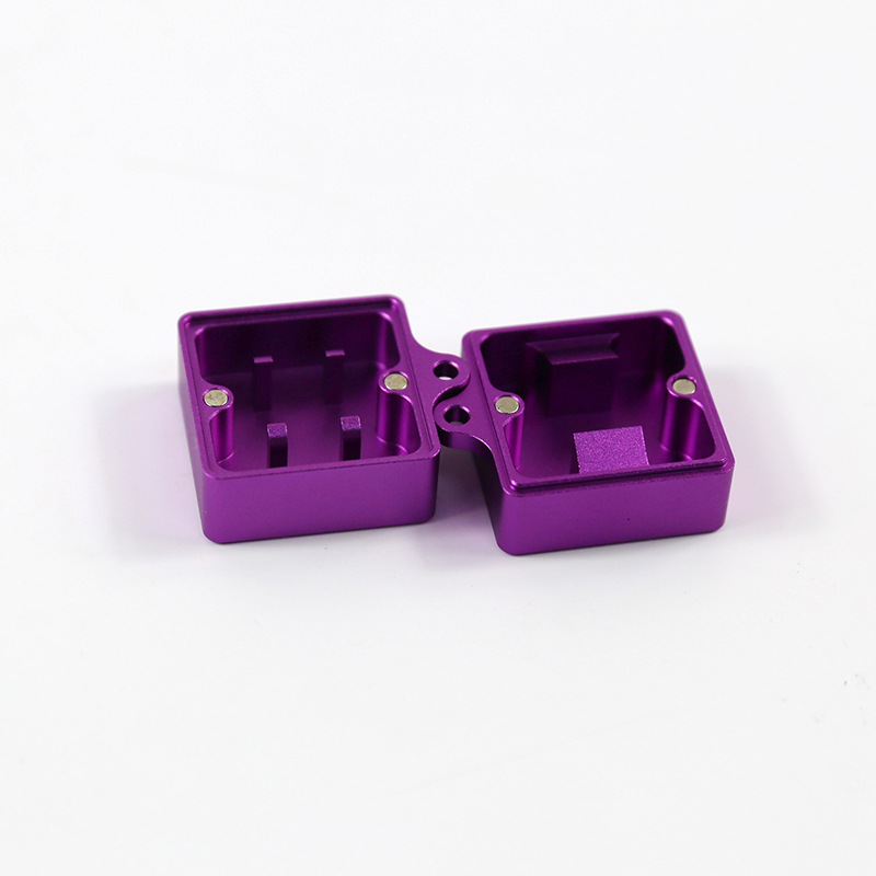 Purple metal keyboard switch opener shown open