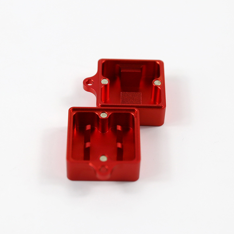 Red metal keyboard switch opener shown open