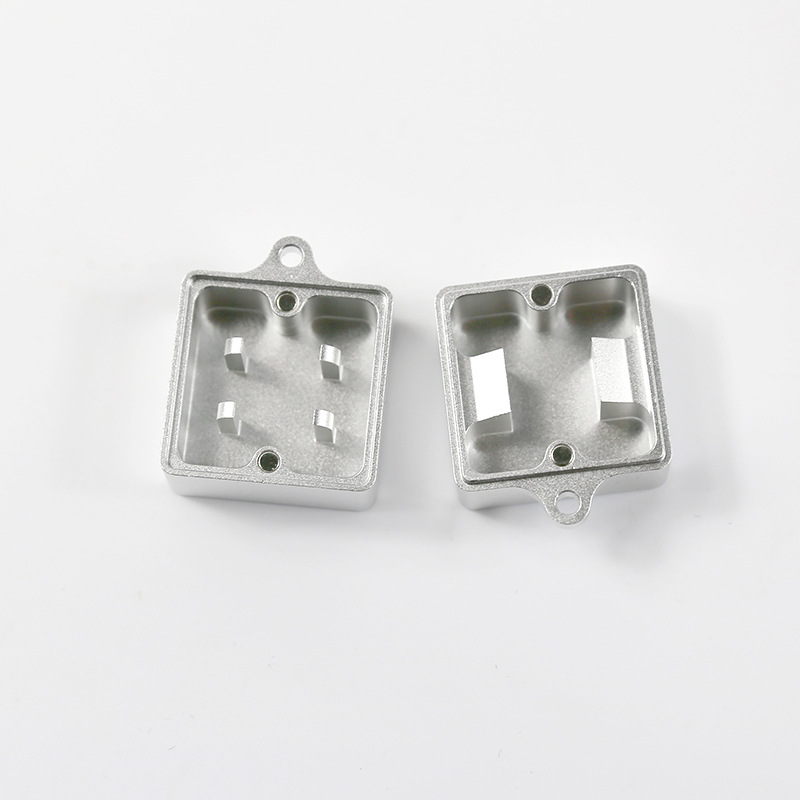 Silver metal keyboard switch opener shown open