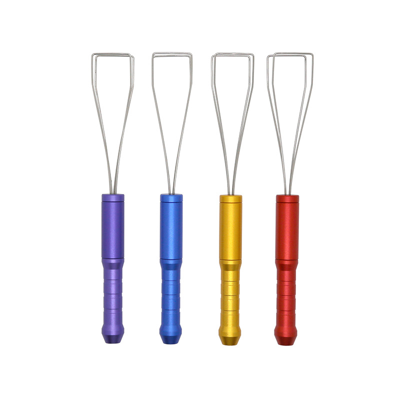 Four three-section metal wire keycap pullers shown upright in multiple finishes